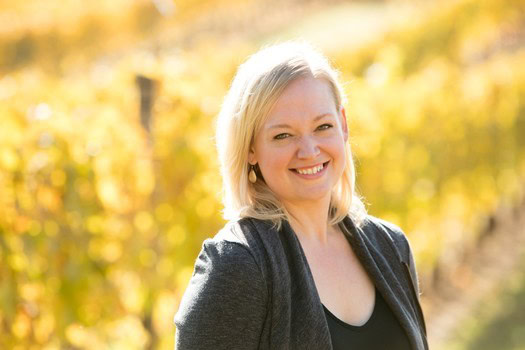 Kim Kramer, Head Winemaker at Kramer Vineyards, smiling.